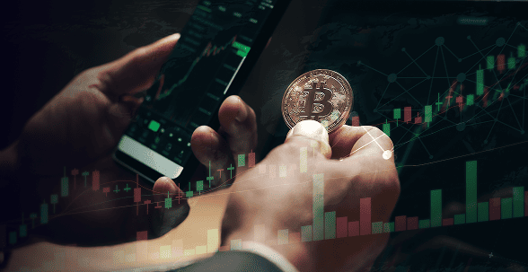 Main tenant bitcoin smartphone graphique trading